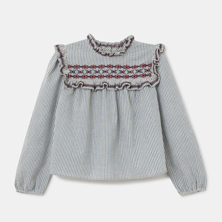 Blusa de niña manga larga con volante.